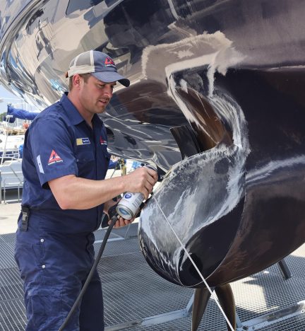 A comparison of an untreated and treated marine engine, highlighting the effectiveness of anti-corrosion protective coatings in preventing rust.