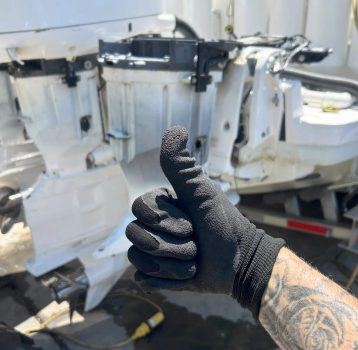 Boat Repair Near Me technician giving a thumbs-up after completing a Yamaha engine repair
